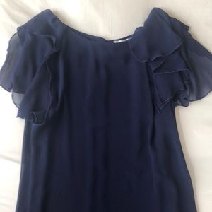 BCBG sheer asymmetrical blouse.